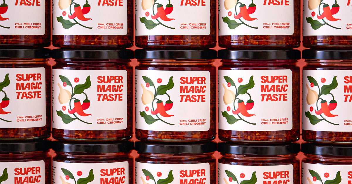 Jars of Super Magic Taste chili crisp lined up on a shelf